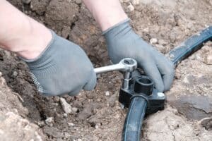 Emergency sprinkler repair service responding to a Frisco TX home